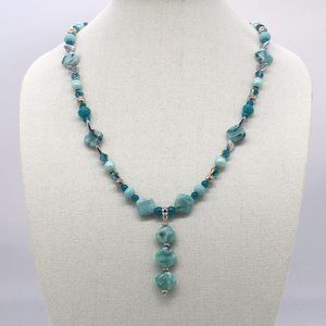 Aqua green Jasmin theme necklace with large silver lobster class.